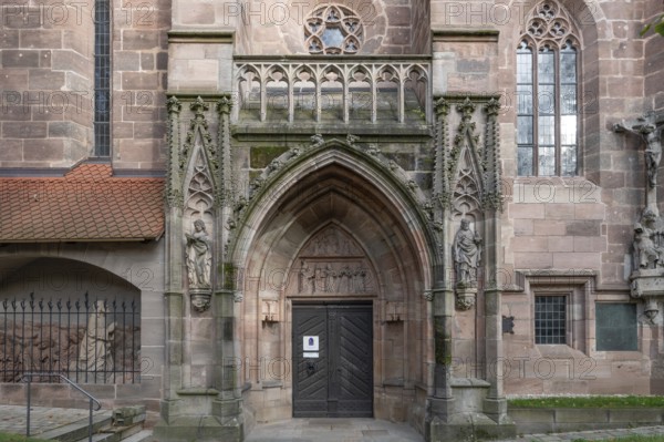 Main entrance portal of St Nicholas and St Ulrich Church, nave built around 1400, Kirchenberg 15, Nuremberg-Mögeldorf, Middle Franconia, Bavaria, Germany, Europe