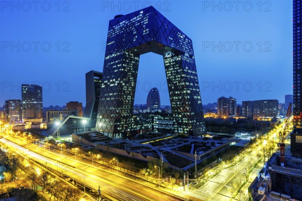 Beijing central business district CBD skyline with the headquarters of Chinese television CCTV at night in Beijing, China, Asia