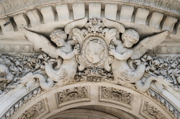 Figures of angels and elaborate floral relief work, Middle Temple Lane entrance, The Inns of Court, London, England, Great Britain