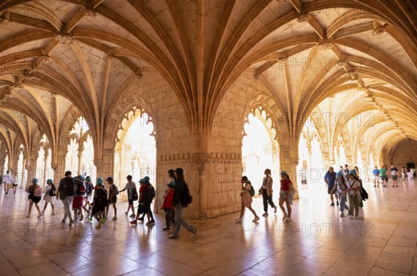 Visitor, Cloister, Hieronymite monastery Mosteiro dos Jerónimos, also Mosteiro de Belém, Belém, Lisbon, Portugal, Europe