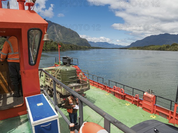 On ferry crossing the river Rio Palena, connecting the road to Puerto Raul Marin Balmaceda, Patagonia, Chile, South America