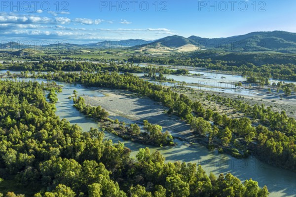 Aerial view of river Rio Maule, flowing through agricultural landscape, central Chile