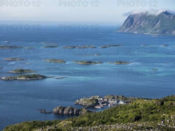 View from Mt. Sukkertoppen over coast at Hamn i Senja, marina of Hamn i Senja, Senja island, Norway, Europe