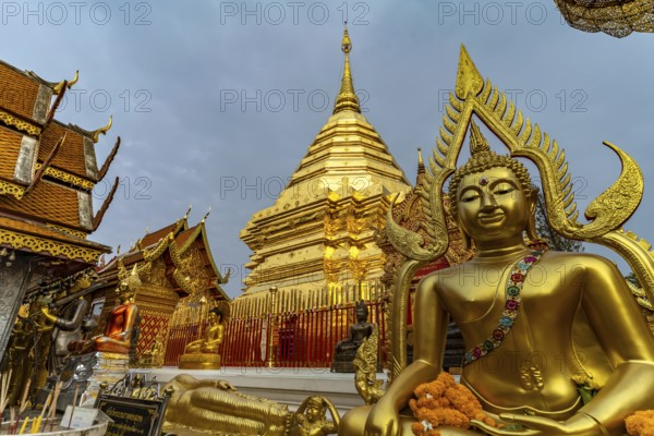 Buddha statue and Golden Chedi of the Buddhist temple complex Wat Phra That Doi Suthep, landmark of Chiang Mai, Thailand, Asia