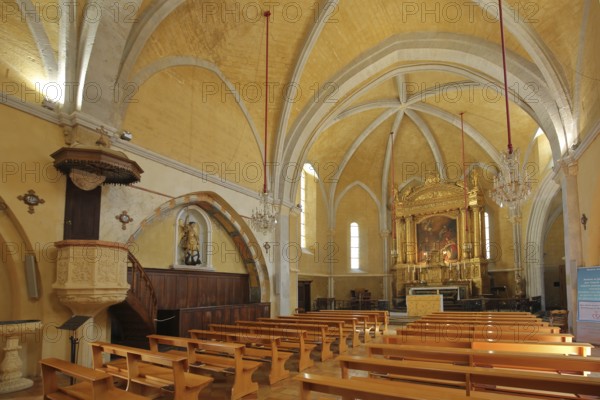 Interior view of Saint Michel church, pulpit, chancel with painting, pews, Salon-de-Provence, Bouches-du-Rhône, Provence, France, Europe