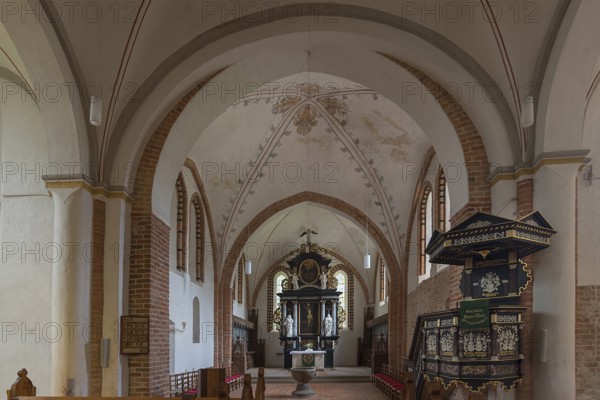 Interior of St Mary's Church, Brick Gothic, at the back the 18th century Baroque altar, on the right the Renaissance pulpit from 1587, Klütz, Mecklenburg-Western Pomerania, Germany, Europe