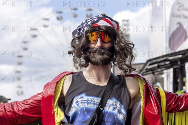 Adenau, Germany, 8 June 2024: Fans enjoy Rock am Ring Festival. The festival takes place at the Nürburgring race track near the town of Adenau from 7 to 9 June 2024, Europe