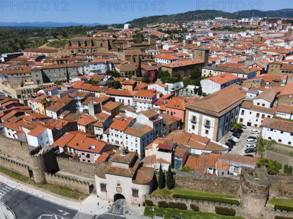 Aerial view of a city with red tiled roofs and old walls on a sunny day, aerial view, Puerta de Trujillo, city gate, city wall, Plasencia, Cáceres, Caceres, Extremadura, Spain, Europe