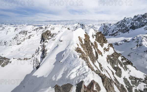 View from the summit of Piz Grialetsch in winter, mountain ridge with snow, Grisons Haute Route, Albula Alps, Rhaetian Alps, Grisons, Switzerland, Europe