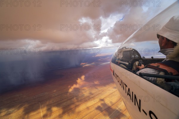 Gliding, glider, pilot, cockpit, clouds, rain, rain shower, desert, Arcus, Namibia, Africa