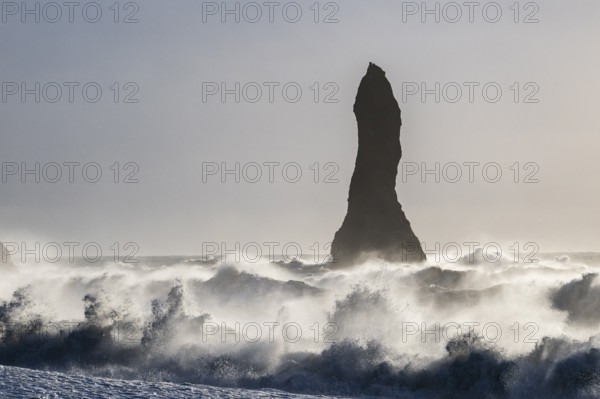Rock needle in stormy surf, Vík í Mýrdal, Suðurland, Iceland, Europe