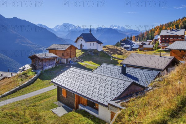 View of the village with Maria zum Schnee chapel in autumn, Bettmeralp, Goms, Rhone Valley, Upper Valais, Valais, Switzerland, Europe