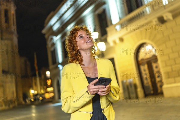 Dynamic shot of a beauty female tourist using phone exploring a city at night