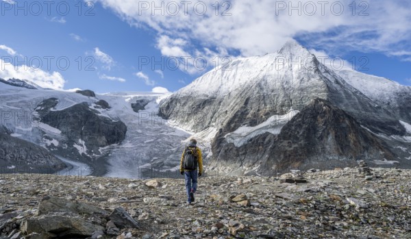 Mountaineer in front of the summit of Mont Blanc de Cheilon and glacier Glacier de Cheilon, Valais Alps, Valais, Switzerland, Europe