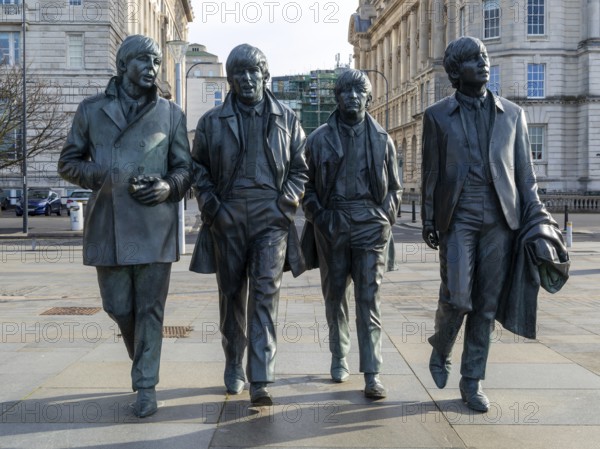 The Beatles statues sculpture by Anthony Edwards, Pier Head, Liverpool, England, UK
