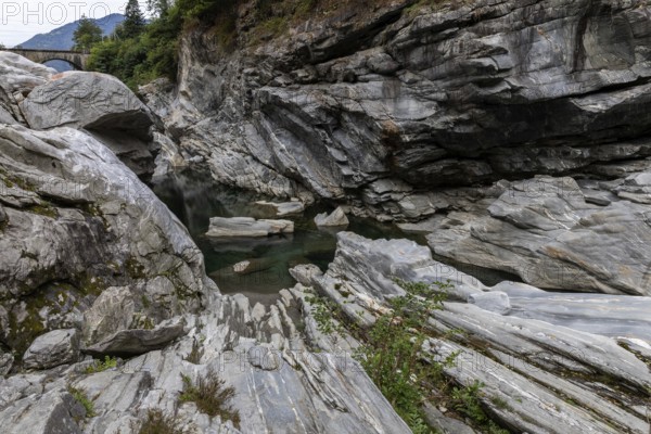 Rocks, granite rock formations in the Maggia River near Ponte Brolla, in the Maggia Valley, Valle Maggia, Canton Ticino, Switzerland, Europe