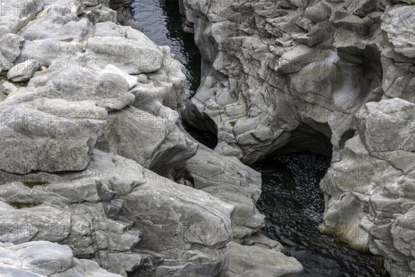 Rocks, granite rock formations in the Maggia River near Ponte Brolla, in the Maggia Valley, Valle Maggia, Canton Ticino, Switzerland, Europe
