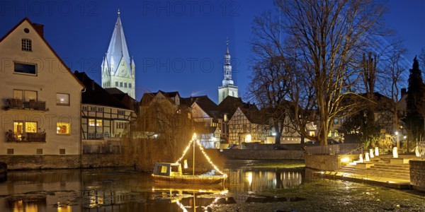 Large pond, St. Patrokli Cathedral and St. Peter's Church in the evening during winter sunshine, Old Town, Soest, North Rhine-Westphalia, Germany, Europe