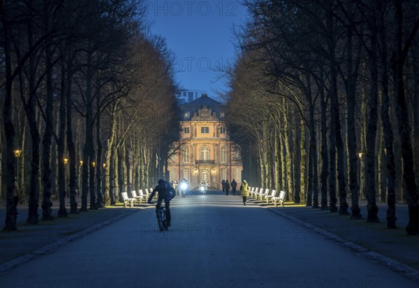 The light benches by artist Stefan Sous in the Hofgarten, entitled UV-A UV-B, 14 completely refurbished exhibits from the 2002 light-grey art exhibition, which now stand and light up as a permanent work of art on Jägerhofallee, LED technology, in the background Jägerhof Palace, home of the Goethe Museum, Düsseldorf, North Rhine-Westphalia, Germany, Europe