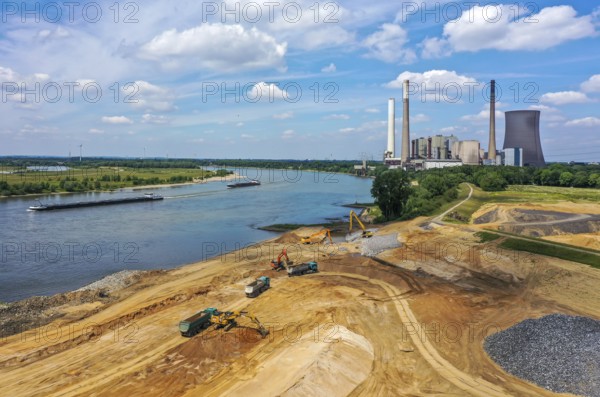 Dinslaken, Voerde, North Rhine-Westphalia, Germany, Emscher estuary into the Rhine. Construction site of the new Emscher estuary in front of the decommissioned STEAG coal-fired power station in Voerde. The mouth of the Emscher into the Rhine is being moved almost 500 metres north from Dinslaken to Voerde. Fish will then be able to swim barrier-free up the new Emscher from the Rhine through a newly created floodplain area. Following the construction of a parallel sewer, the Emscher has been completely free of sewage since January 2022. The river was previously an open, above-ground combined sewer with rainwater and wastewater, Europe