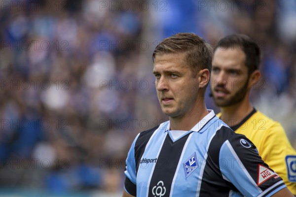 Football 3rd division, season 2024/25, matchday 8: Waldhof Mannheim vs Rot-Weiß Essen. Picture: Martin Kobylansik (10, Mannheim)