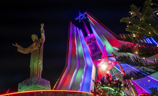 A Church decorated with illuminated lights on the Christmas eve, at a Church on December 24, 2023 in Guwahati, India. Christmas is a festive holiday celebrated on December 25th, marking the birth of Jesus Christ in Christian tradition.
