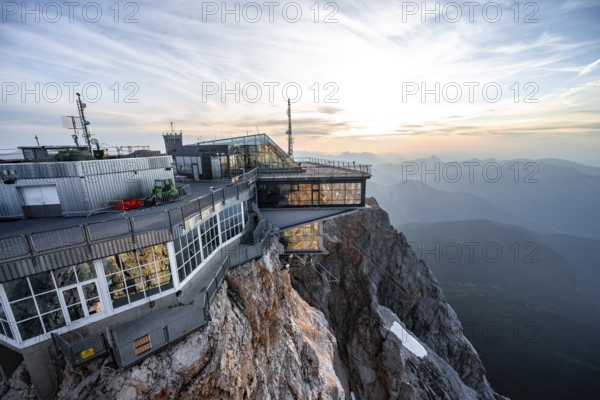 Modern mountain station of the Bavarian Zugspitze railway at the summit of the Zugspitze, at sunset, Wetterstein Mountains, Northern Limestone Alps, Bavaria, Germany, Europe