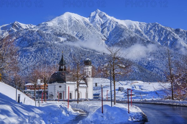 Seekirchl with Reitherspitze 2374m in winter, Seefeld, Seefeld Plateau, Tyrol, Austria, Europe
