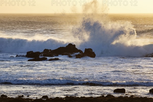Rocky west coast, black lava coast, coastline, surf at sunset, El Golfo, Yaiza, Lanzarote, Spain, Europe