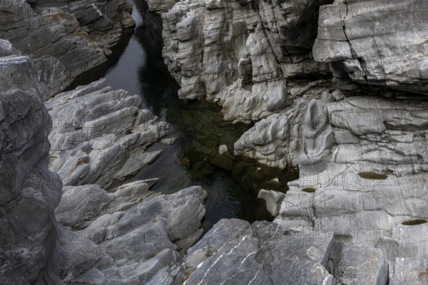 Rocks, granite rock formations in the Maggia River near Ponte Brolla, in the Maggia Valley, Valle Maggia, Canton Ticino, Switzerland, Europe