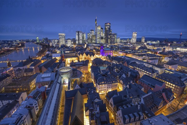 St Paul's Church in Frankfurt am Main will be illuminated in blue in the middle of the Christmas market on 10 December 2024, International Human Rights Day. This commemorates the declaration of the UN Human Rights Charter of 10 December 1948. Frankfurt am Main, Römerberg, Hesse, Germany, Europe