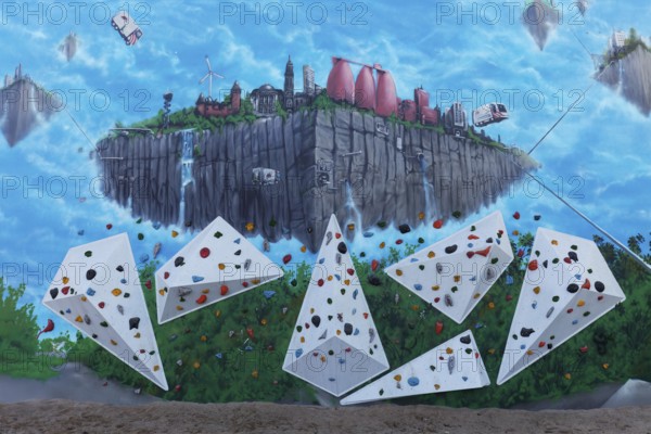 Climbing wall with surreal mural, flying city, by artist duo TUBUKU, Voltaplatz skate park, Krefeld, North Rhine-Westphalia, Germany, Europe