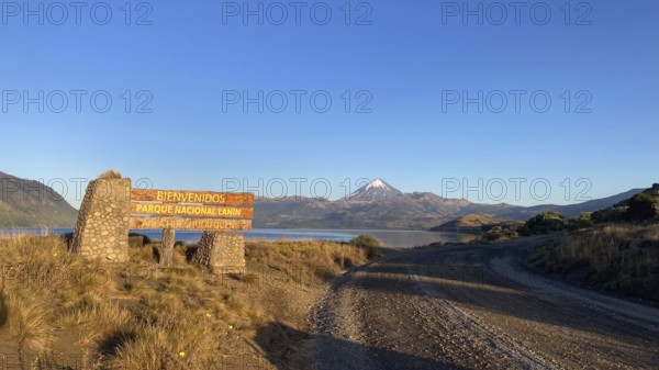 Dirt road to the entrance of Lanin National Park with the Lanin Volcano, Patagonia, Argentina, South America
