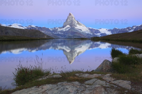 Matterhorn and mountain lake, Stellisee, Valais, Switzerland, Europe