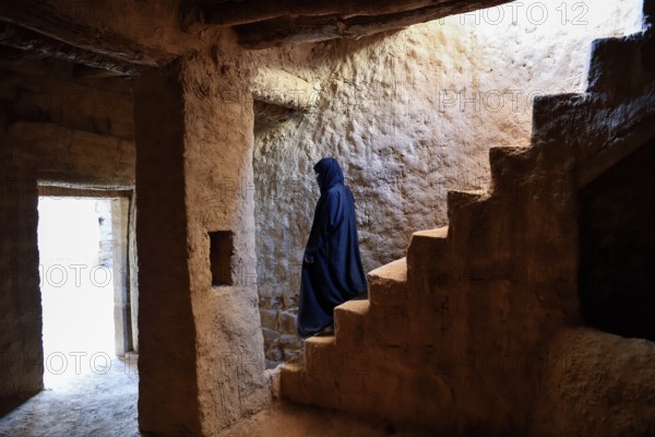 Local Veiled Woman in the Old City of AlUla, Medina Province, Saudi Arabia, Arabian Peninsula, Asia