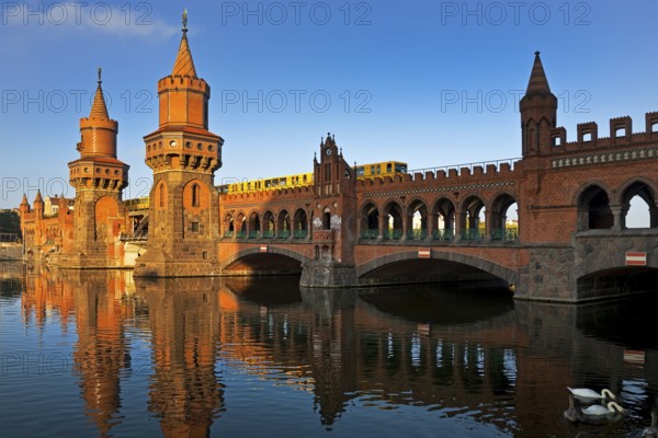 Oberbaum Bridge over the Spree with yellow underground, Friedrichshain-Kreuzberg district, Berlin, Germany, Europe