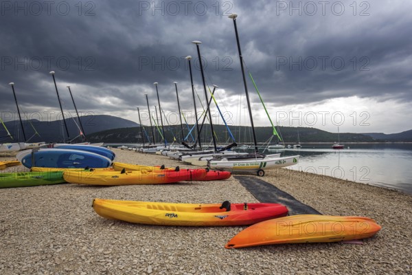 Boats on the beach in Sainte Croix du Verdon, Lac de Sainte-Croix, thunderstorm atmosphere, Provence-Alpes-Côte d'Azur, Provence, France, Europe