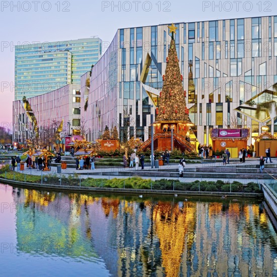 Dreischeibenhaus and Christmas market in front of the Koe-Bogen by architect Daniel Libeskind, Düsseldorf, North Rhine-Westphalia, Germany, Europe