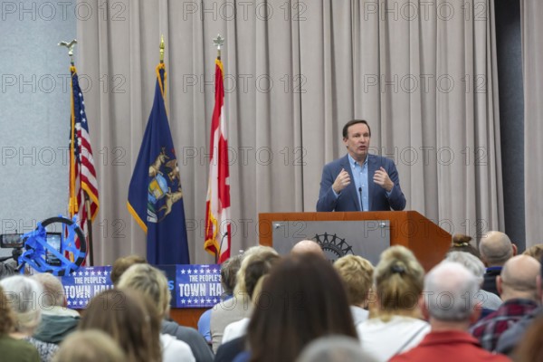 Warren, Michigan USA - 29 March 2025 - The Michigan Democratic Party hosted a 'People's Town Hall.' An overflow crowd at a UAW hall listened to Sen. Chris Murphy (D-Conn). Speakers targeted Representative John James, a Republican who represents the Macomb County district where the event was held, for refusing to meet with his constituents