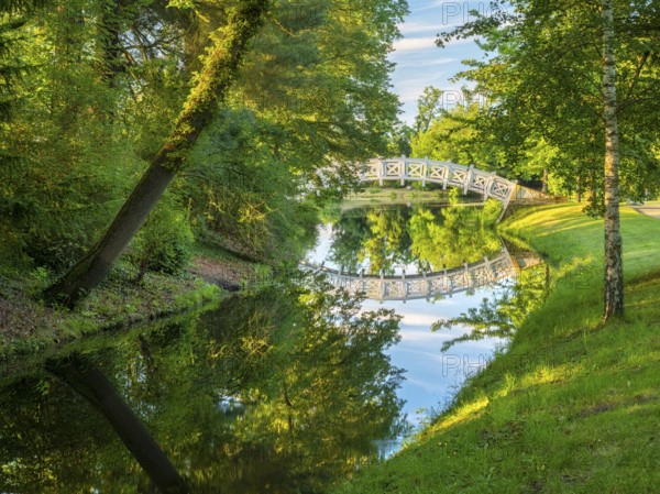 The Chinese or White Bridge in Wörlitz Park in the evening light, Garden Kingdom Dessau-Wörlitz, Wörlitz, Saxony-Anhalt Germany