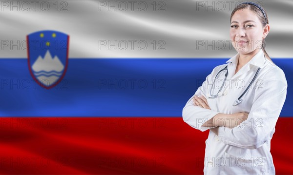 Female Doctor on Slovenian Flag. Doctor with Crossed Arms on Slovenian Flag. Slovenia Health and Care Concept