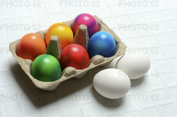 Colourful Easter eggs in packaging, Easter celebration