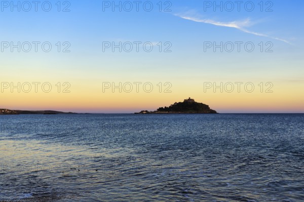 St Michael's Mount, tidal island with castle, evening sky, single cirrus, Marazion, Cornwall, England, Great Britain