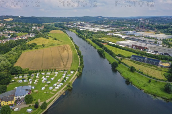 Hattingen, North Rhine-Westphalia, Germany - Cityscape on the Ruhr, Ruhr promenade, in front a camping site, behind the LWL Industrial Museum Henrichshütte Hattingen
