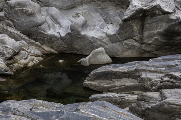 Rocks, granite rock formations in the Maggia River near Ponte Brolla, in the Maggia Valley, Valle Maggia, Canton Ticino, Switzerland, Europe