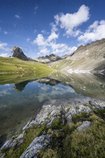 Mountain lake Bödensee with reflection, mountain landscape with summit Gösleswand and Finsterkarspitze, Lasörlinggruppe, Hohe Tauern National Park, East Tyrol, Austria, Europe