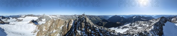 Panorama at the summit of the Wilder Freiger with summit cross and with glacier Übeltalferner and Wilder Freiger Ferner, picturesque mountain landscape, aerial view, Stubai Alps, South Tyrol, Italy, Europe