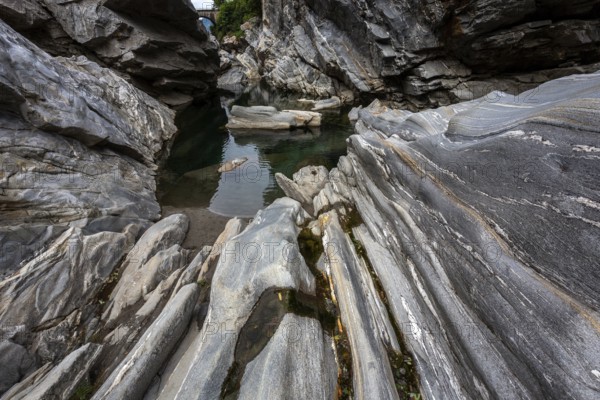 Rocks, granite rock formations in the Maggia River near Ponte Brolla, in the Maggia Valley, Valle Maggia, Canton Ticino, Switzerland, Europe