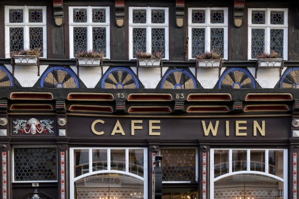 Half-timbered house from 1583, listed building, Cafe Wien, Old Town, Wernigerode, Harz, Saxony-Anhalt, Germany, Europe