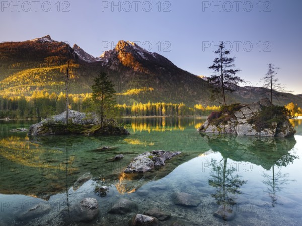 Hintersee in the morning in the first sunlight, behind the peaks of the Hochkalter, Berchtesgaden National Park, Ramsau, Berchtesgadener Land, Upper Bavaria, Bavaria, Germany, Europe
